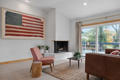 a view of a livingroom with furniture and window