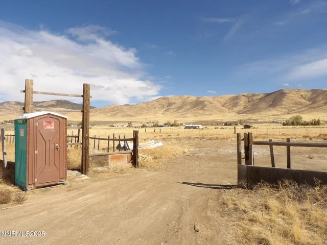 a view of an ocean and a mountain