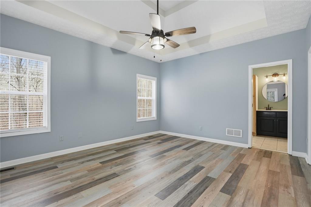 3664 McEver Lake Road Pendergrass, GA 30567 - Photo 12 of 39 a view of a room with a ceiling fan and window