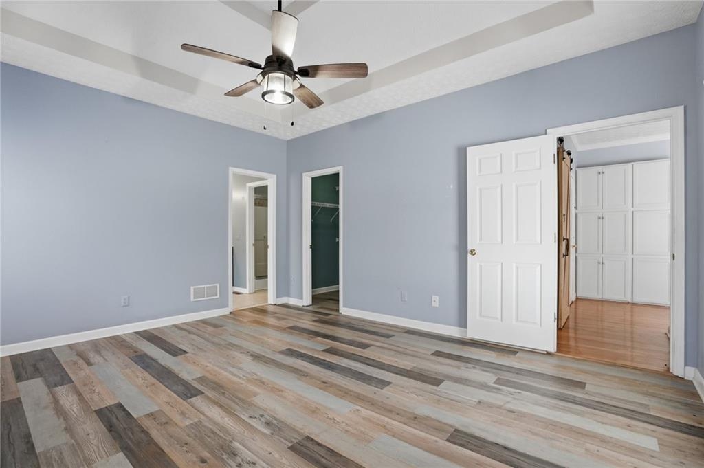 3664 McEver Lake Road Pendergrass, GA 30567 - Photo 14 of 39 a view of a room with a ceiling fan