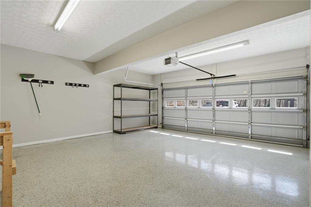 3664 McEver Lake Road Pendergrass, GA 30567 - Photo 32 of 39 a view of a garage