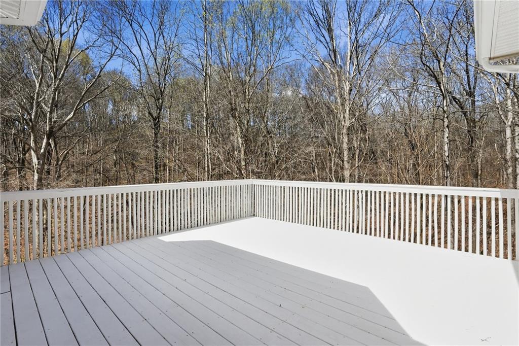3664 McEver Lake Road Pendergrass, GA 30567 - Photo 34 of 39 a balcony with wooden floor