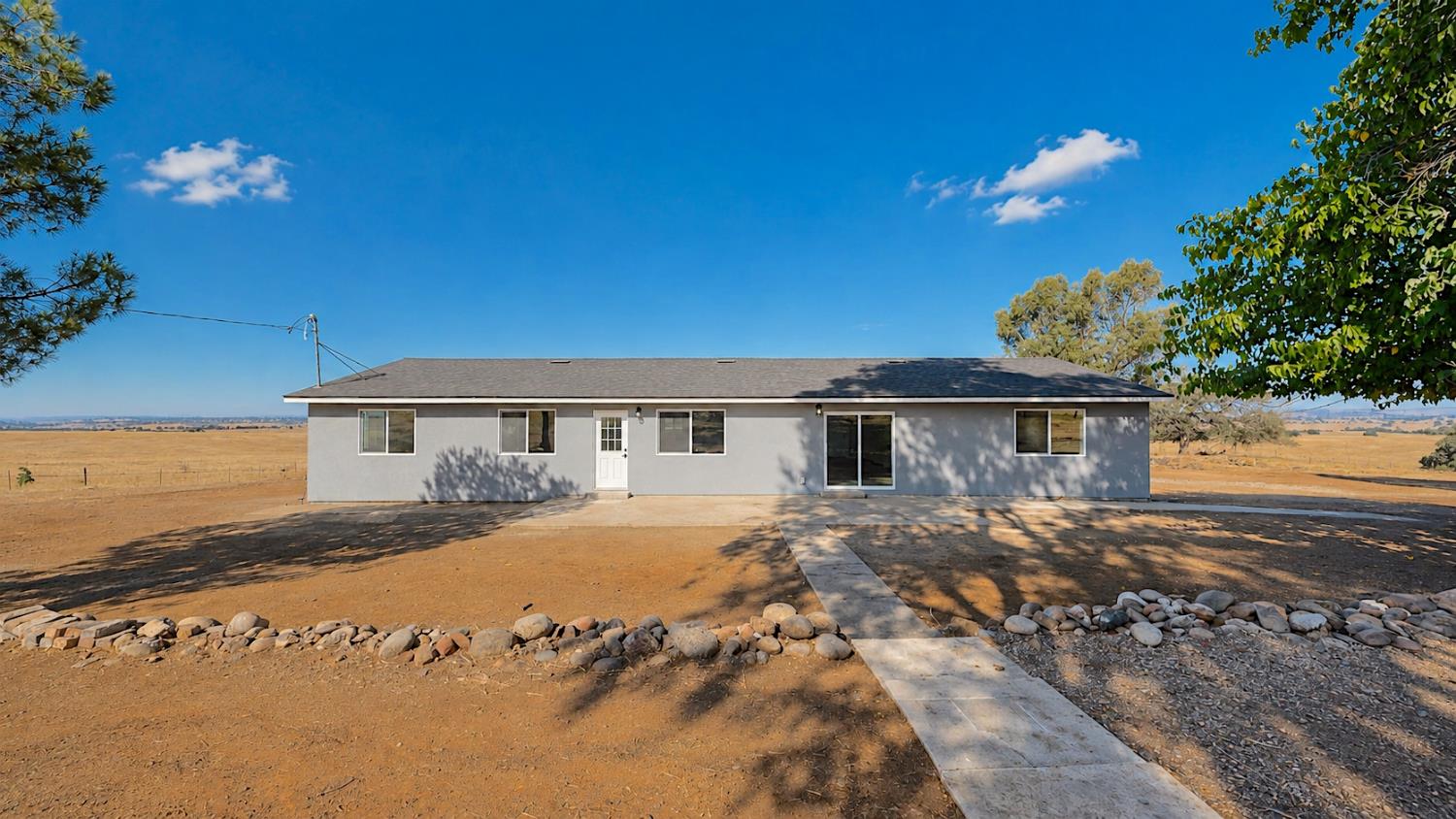 4728 Zorro Road La Grange, CA 95329 - Photo 1 of 56 View from the Front/Street. Single-story residence featuring a light gray exterior