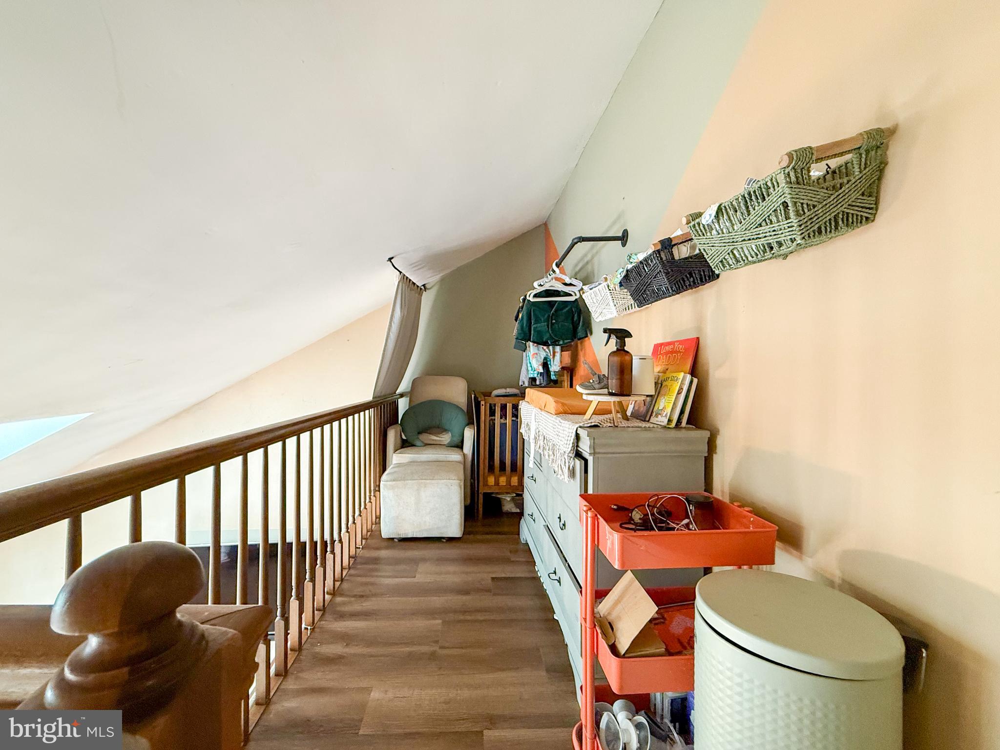 115 Upper Valley Lane Newark, DE 19711 - Photo 14 of 21 a living room with furniture and a wooden floor