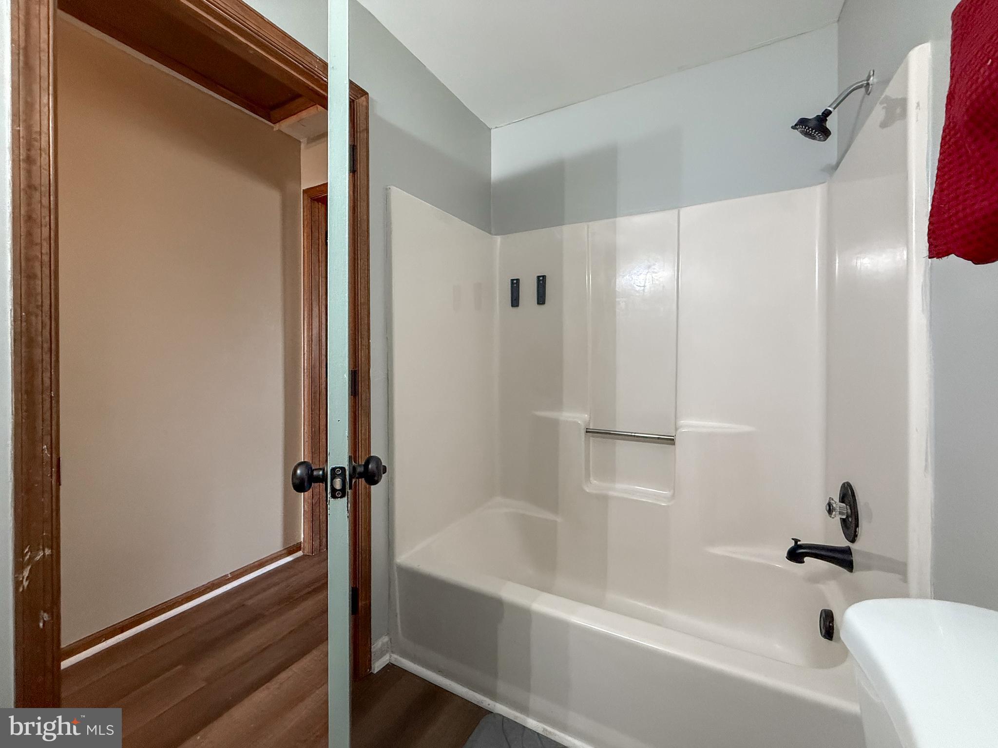 115 Upper Valley Lane Newark, DE 19711 - Photo 20 of 21 a bathroom with a bathtub and a shower