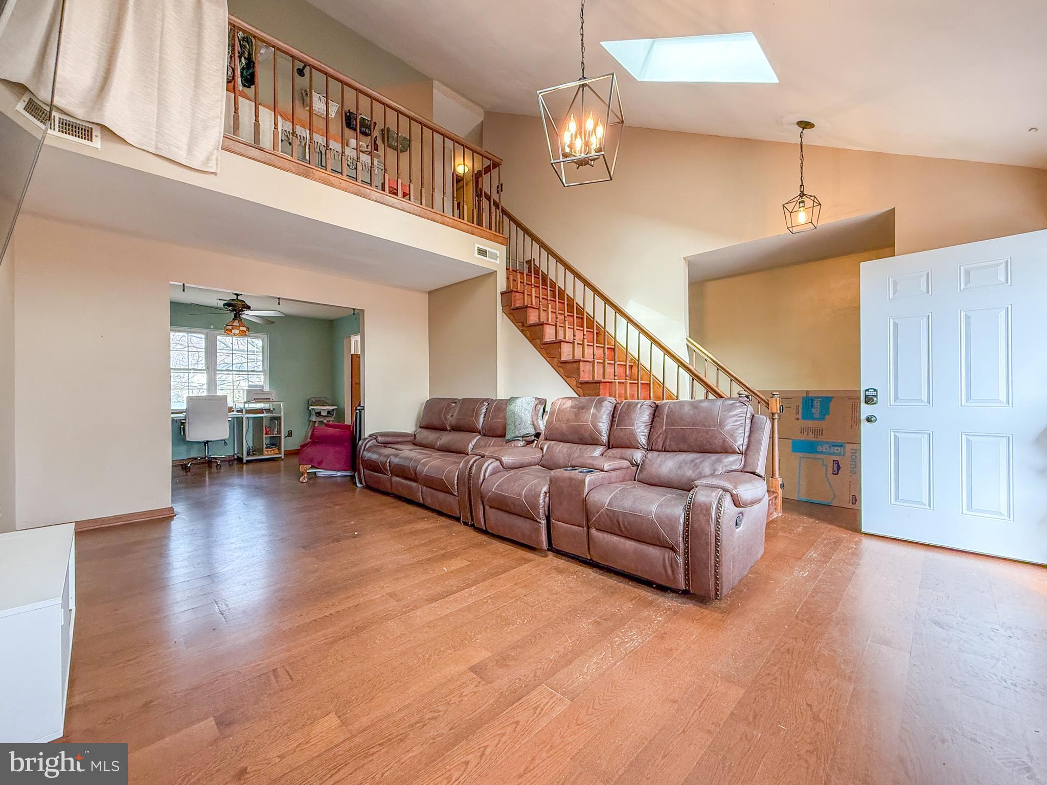 115 Upper Valley Lane Newark, DE 19711 - Photo 3 of 21 a living room with furniture and wooden floor