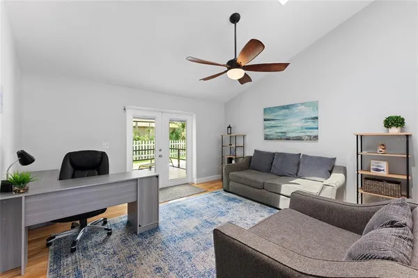 a living room with furniture and a window