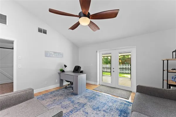 a living room with furniture and a window