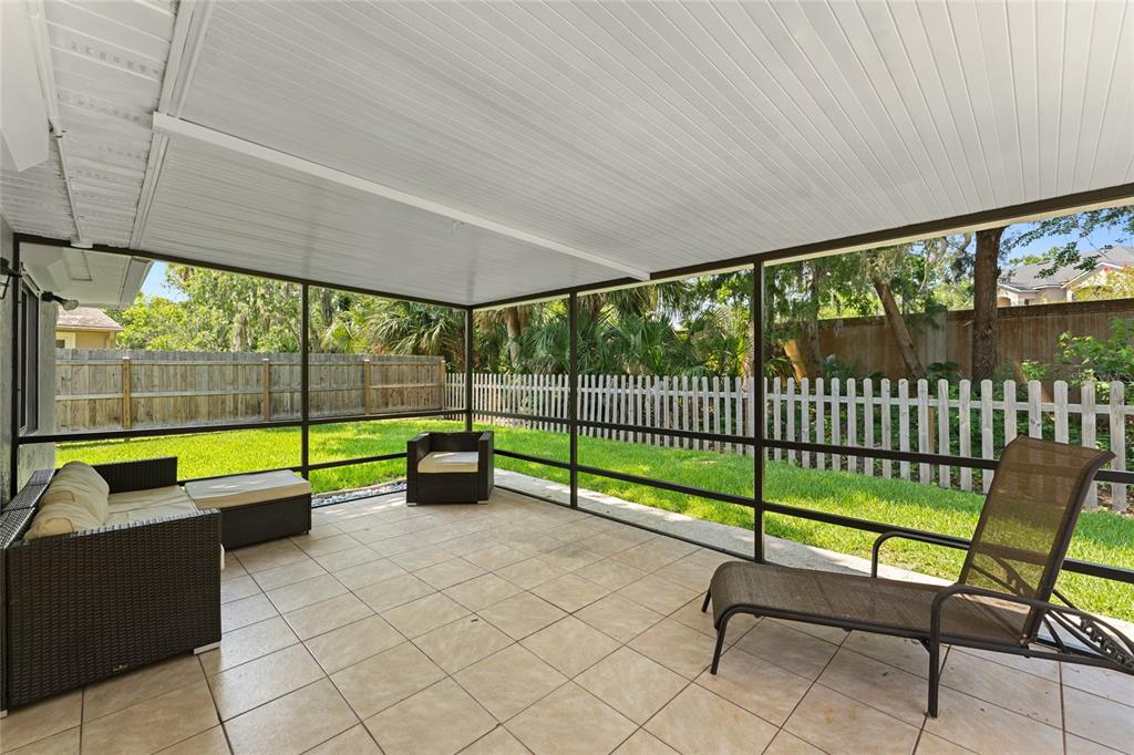 909 Bentwood Lane, Unit 1 Port Orange, FL 32127 - Photo 30 of 36 a view of park with furniture