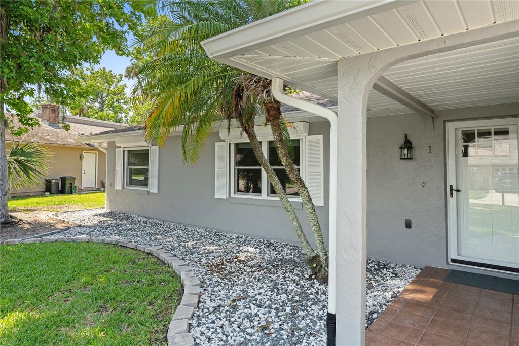 909 Bentwood Lane, Unit 1 Port Orange, FL 32127 - Photo 32 of 36 a front view of a house