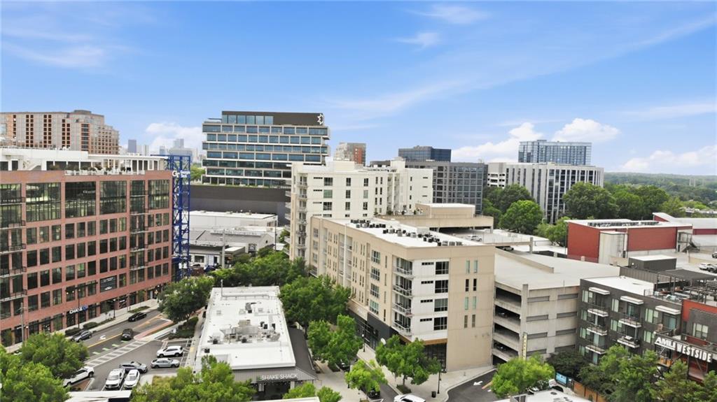 1100 Howell Mill Road Northwest, Unit 608 Atlanta, GA 30318 - Photo 33 of 37 a view of a city with tall buildings