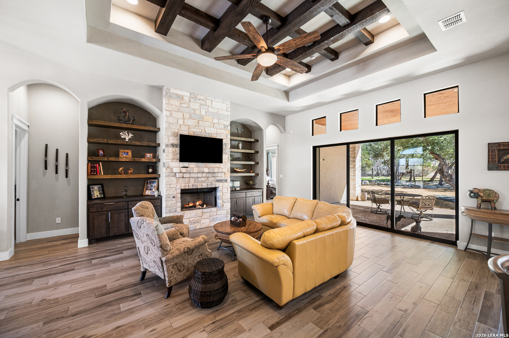 407 Havasu Spring Branch, TX 78070 - Photo 13 of 70 a living room with furniture a fireplace and a flat screen tv