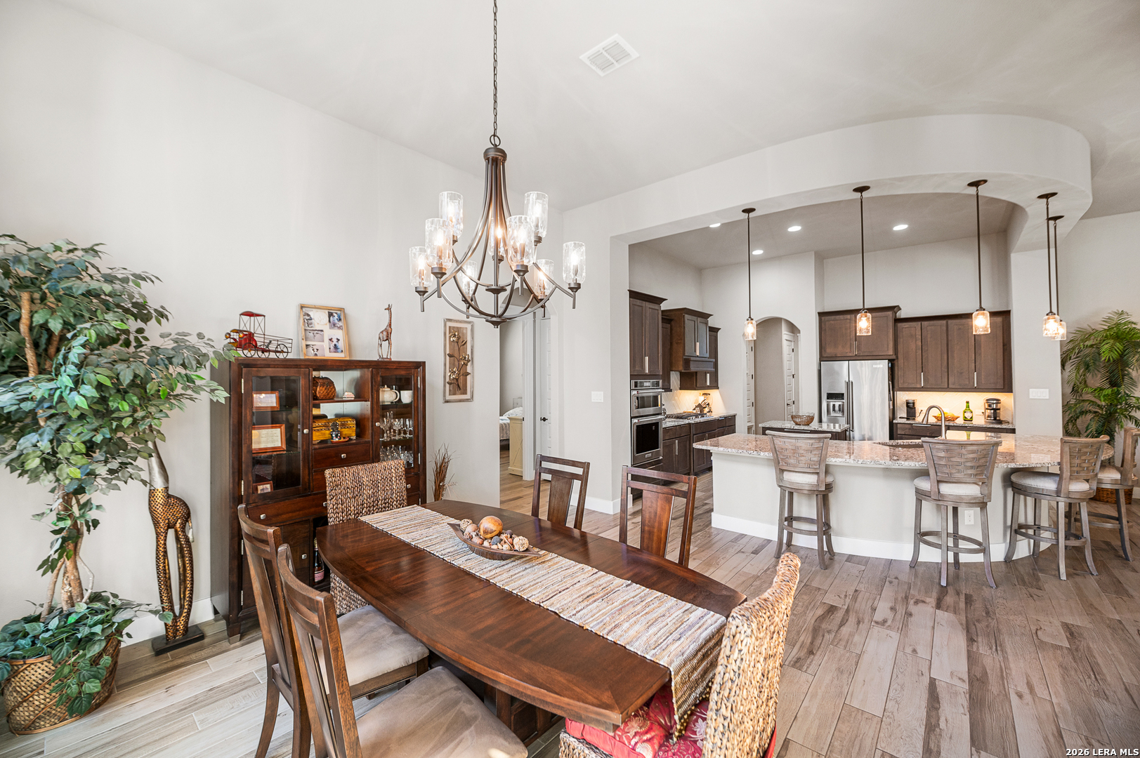 407 Havasu Spring Branch, TX 78070 - Photo 21 of 70 a view of a dining room with furniture and chandelier