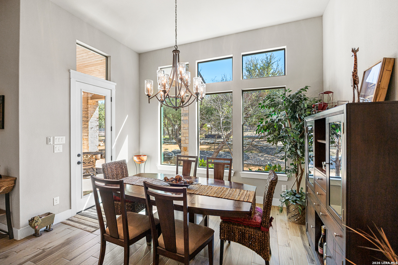 407 Havasu Spring Branch, TX 78070 - Photo 22 of 70 a view of a dining room with furniture window and wooden floor
