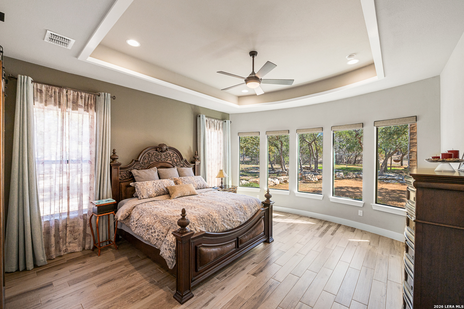 407 Havasu Spring Branch, TX 78070 - Photo 24 of 70 a bedroom with a large bed and a large window