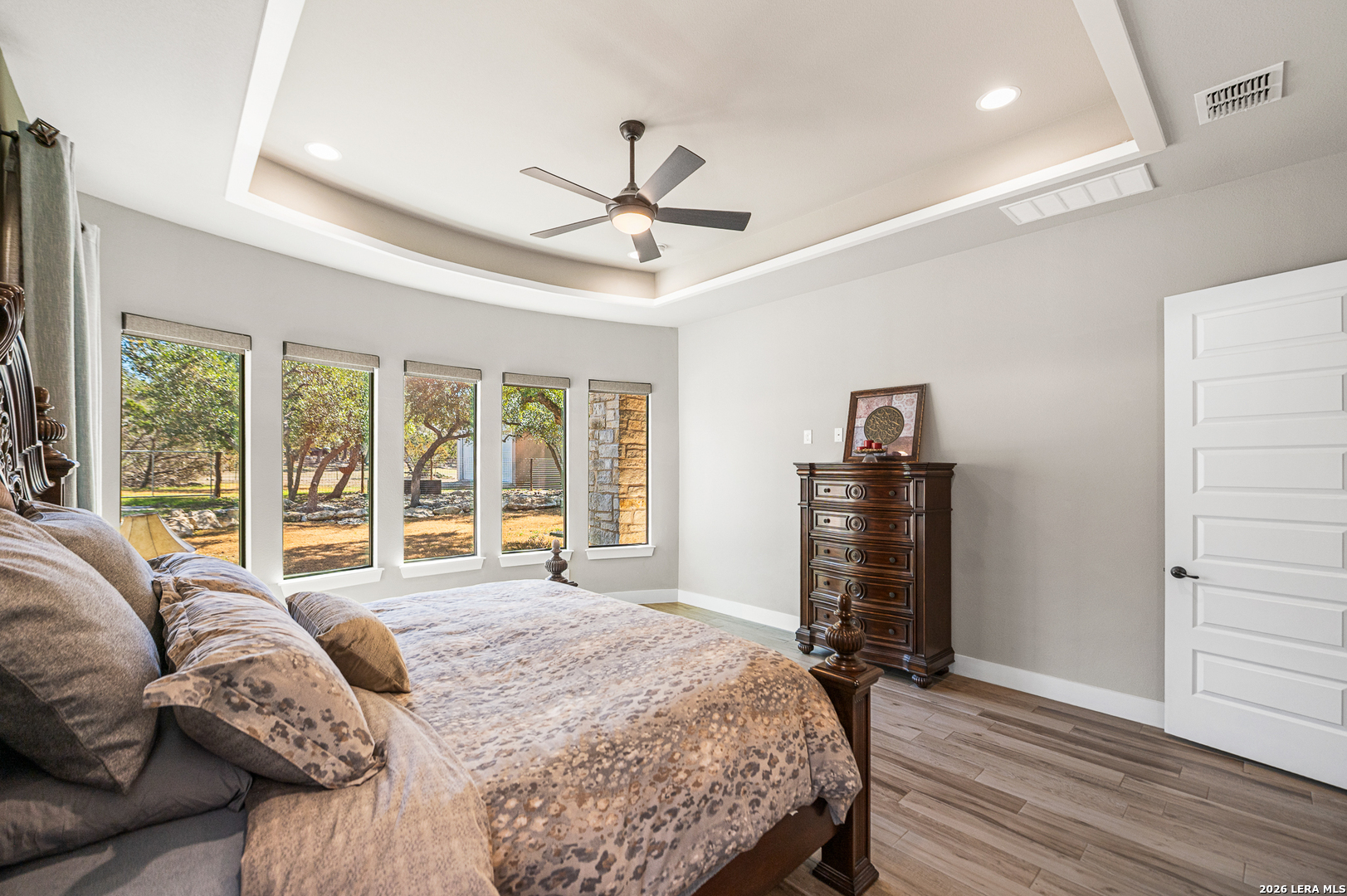 407 Havasu Spring Branch, TX 78070 - Photo 25 of 70 a bedroom with a bed dresser and a large window