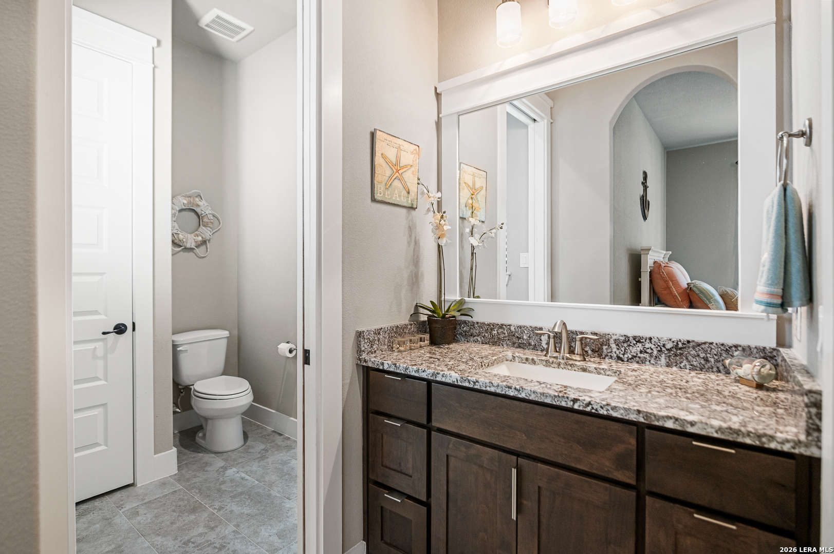 407 Havasu Spring Branch, TX 78070 - Photo 40 of 70 a bathroom with a granite countertop sink and a mirror