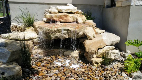a view of a livingroom with furniture and window