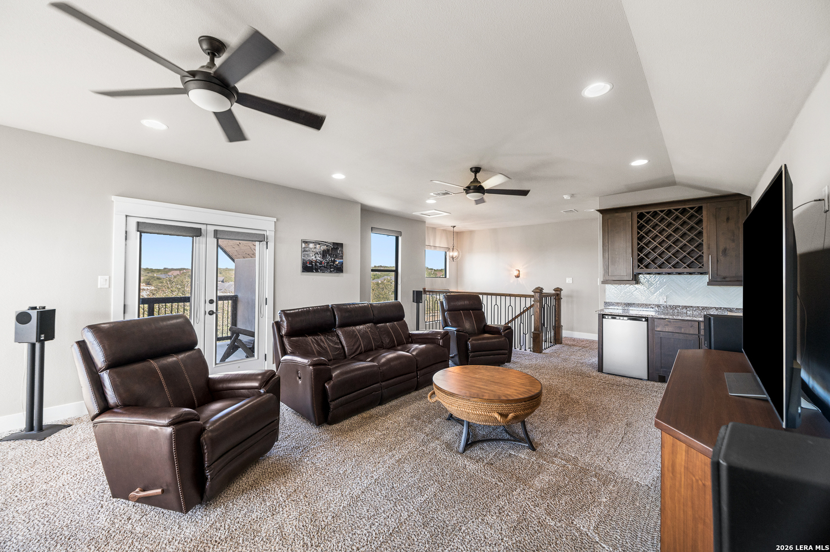 407 Havasu Spring Branch, TX 78070 - Photo 52 of 70 a living room with furniture a ceiling fan and a rug