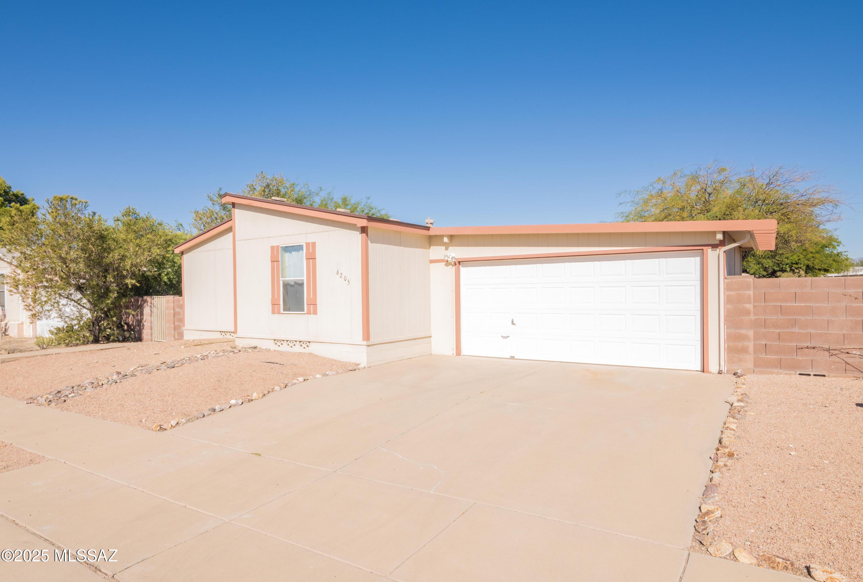 6205 East Rough Rock Drive Tucson, AZ 85756 - Photo 25 of 30 a view of a house with a outdoor space