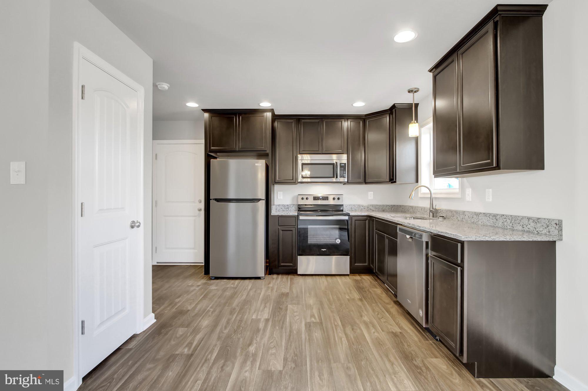 662 Stoverstown Road York, PA 17408 - Photo 11 of 22 Similar - cabinets are white with eat in bar