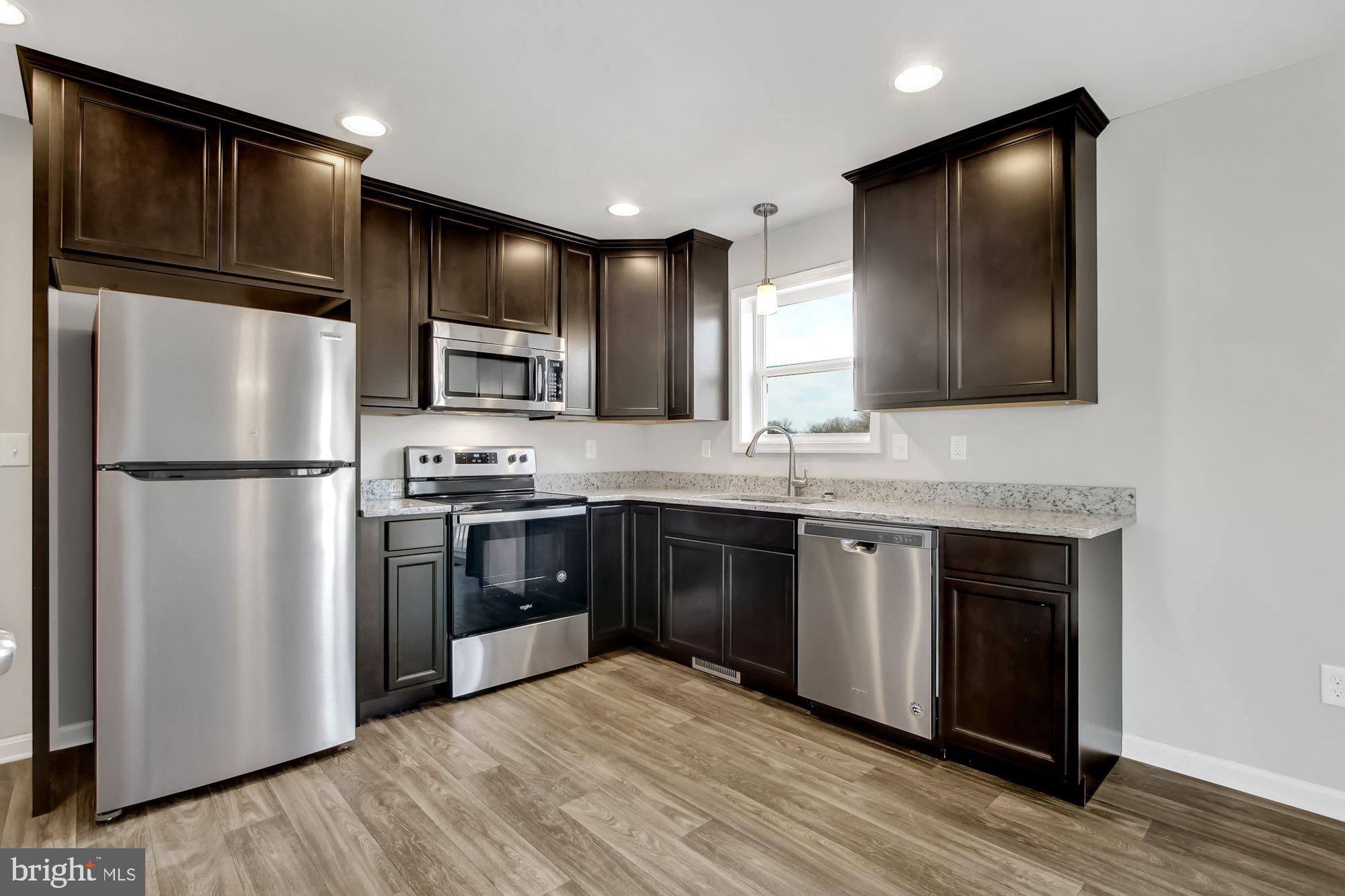 662 Stoverstown Road York, PA 17408 - Photo 12 of 22 Similar - cabinets are white with eat in bar
