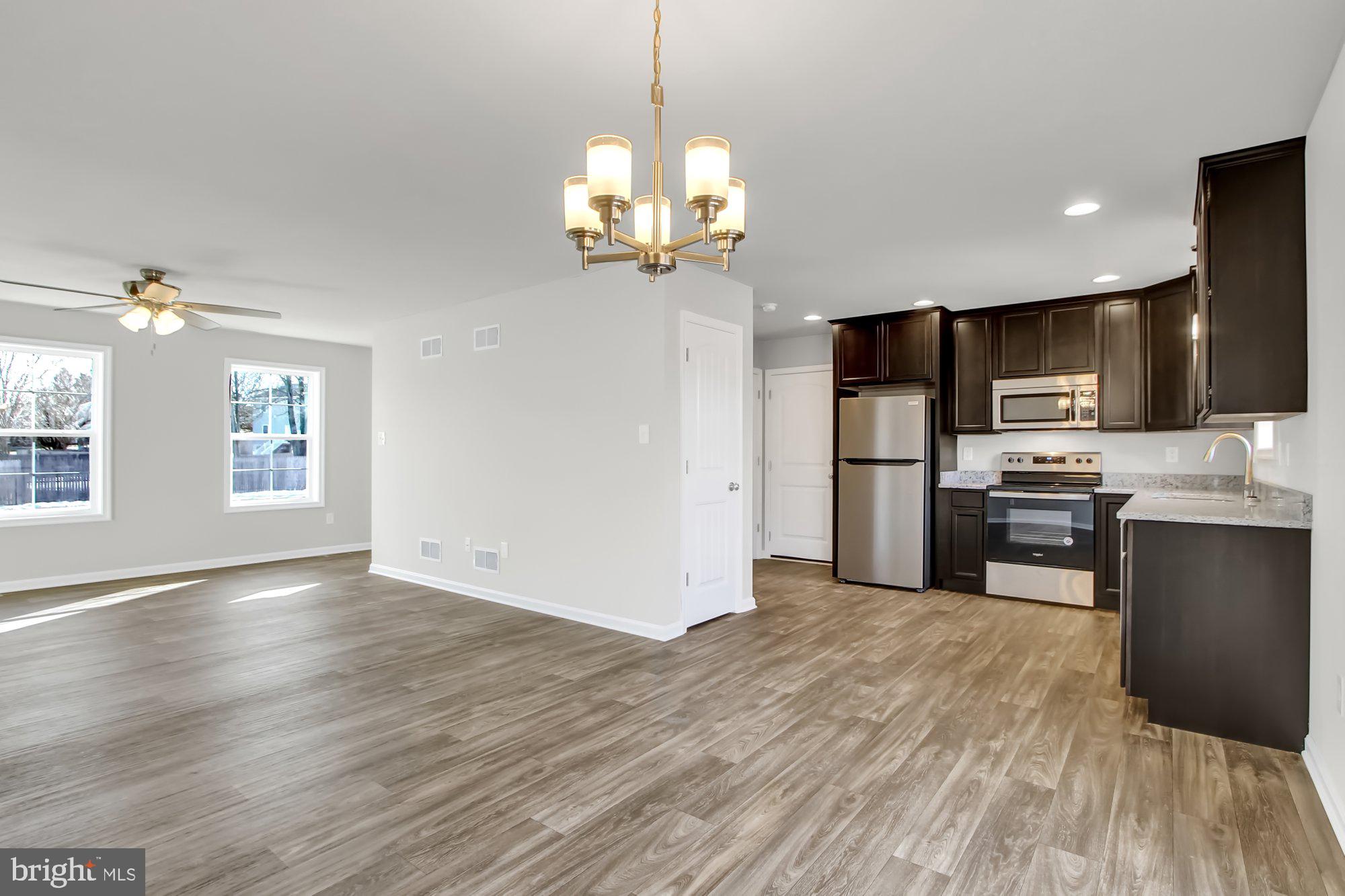 662 Stoverstown Road York, PA 17408 - Photo 10 of 22 Similar - cabinets are white with eat in bar