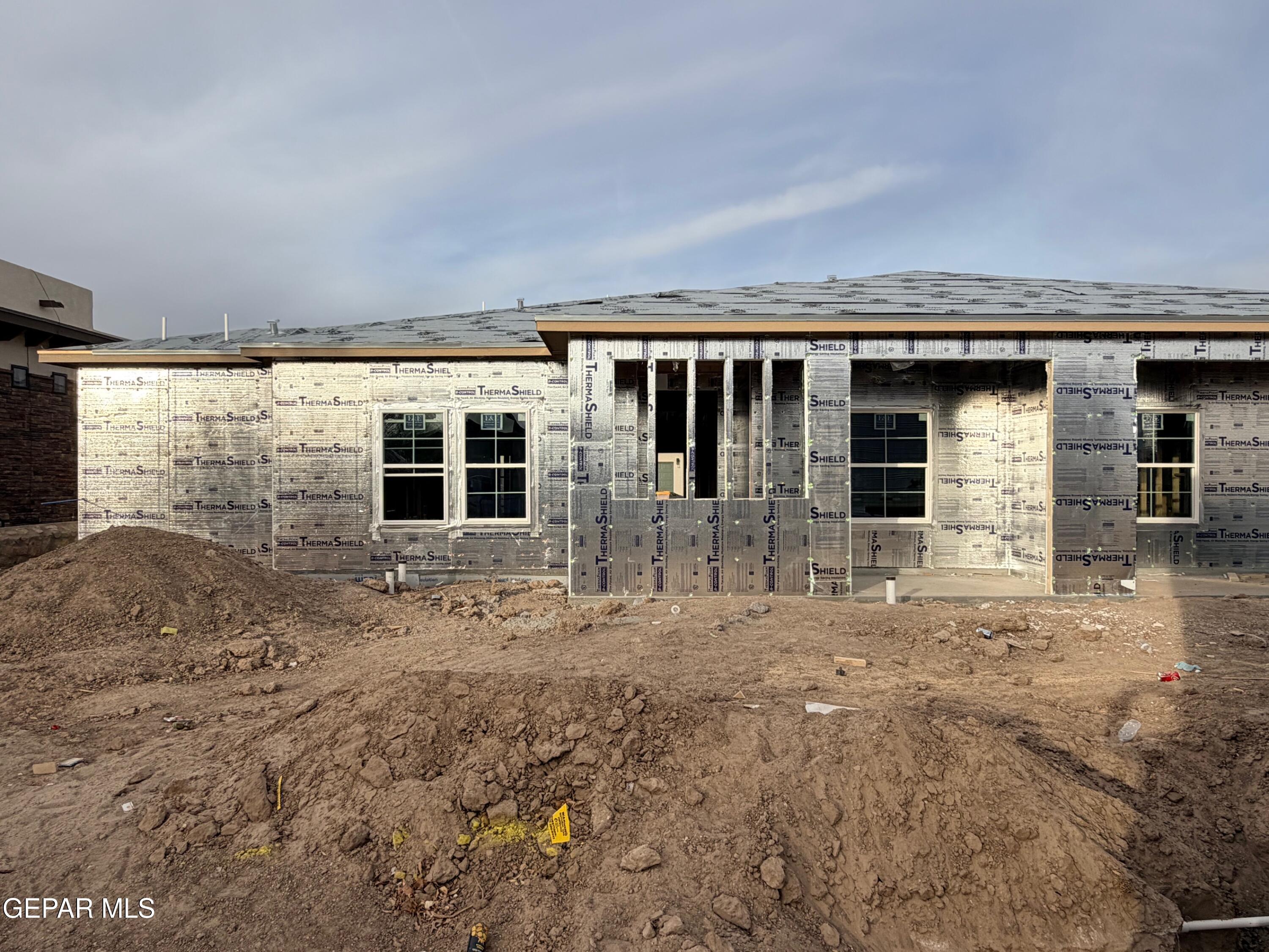 a front view of a house with windows