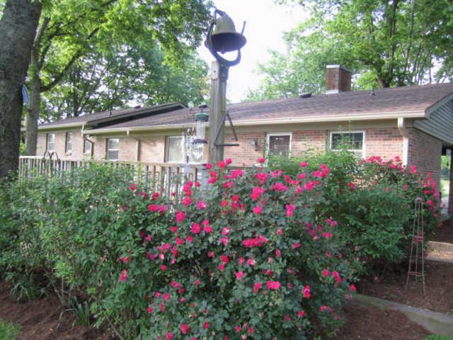 2050 Vales Mill Road Pulaski, TN 38478 - Photo 2 of 20 Relax & Watch Over Your Horses or Cows from the Back Deck that's Surrounded by Flowers (Also Not Pictured this House has 750 sq. ft. of Basement Space for Storage/Shop/Safe Room or could be re-modeled for extra living space)