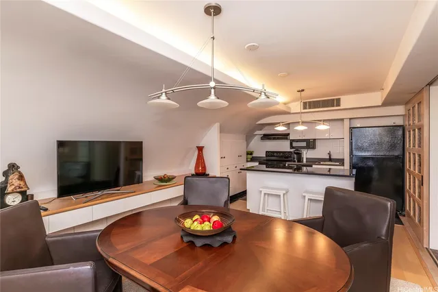 a bedroom with a large bed and a large window