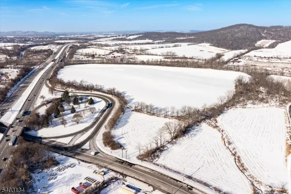 a view of water heater and a wooden floor