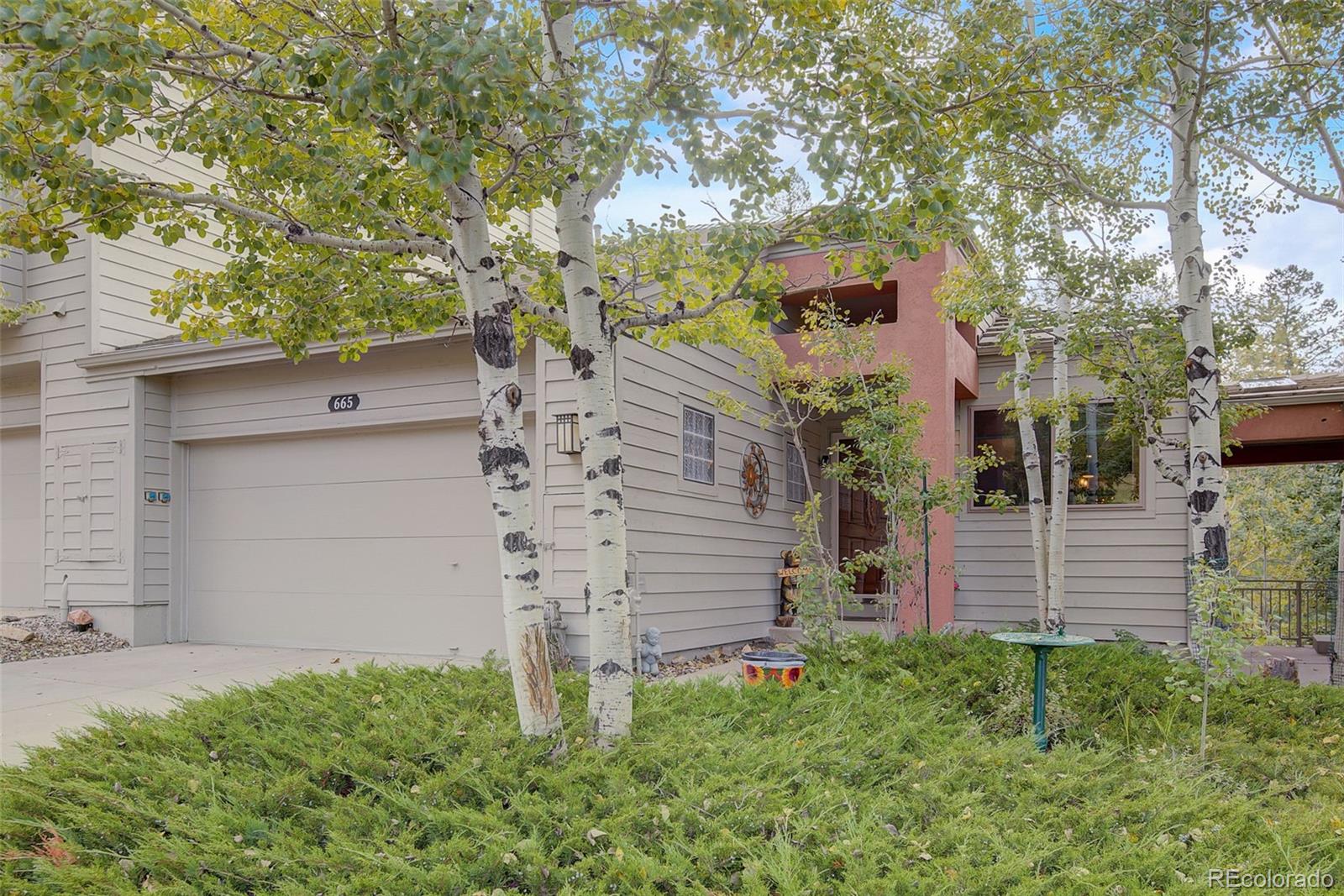 front view of a house with a small yard