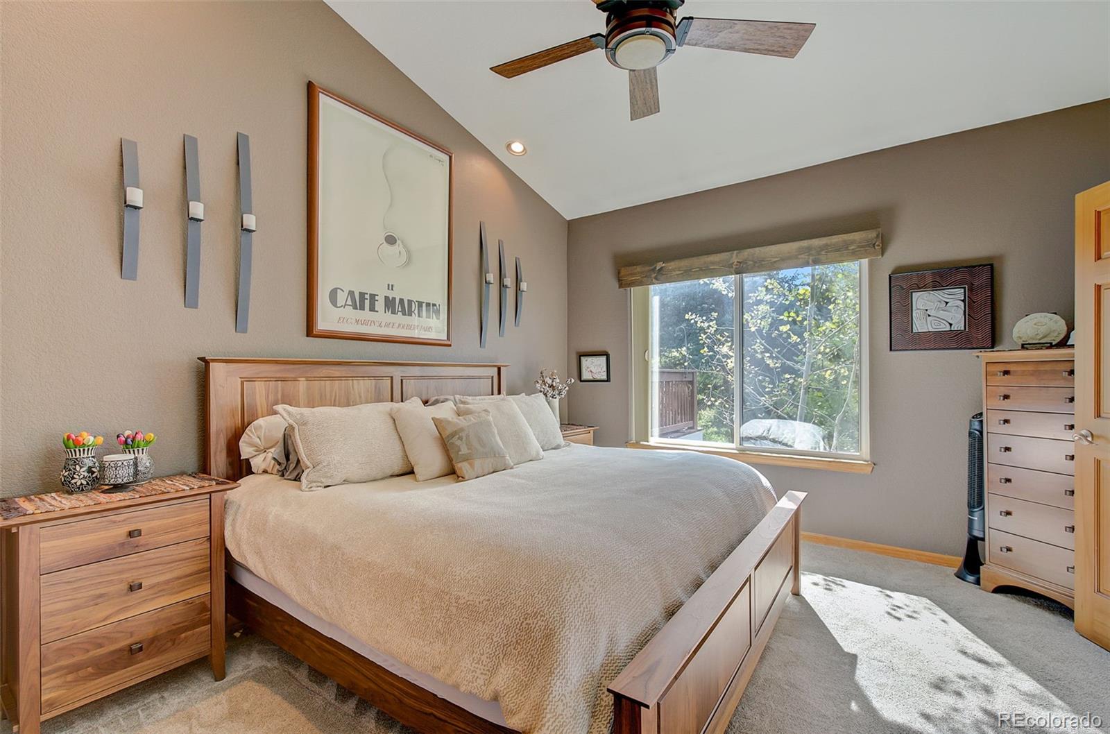 665 Trailside Drive Golden, CO 80401 - Photo 20 of 40 a bedroom with a bed and a dresser