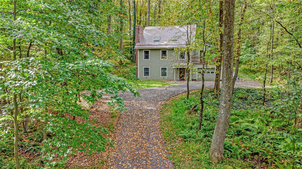 508 Forest Road Acme, PA 15610 - Photo 2 of 29 a view of a back yard