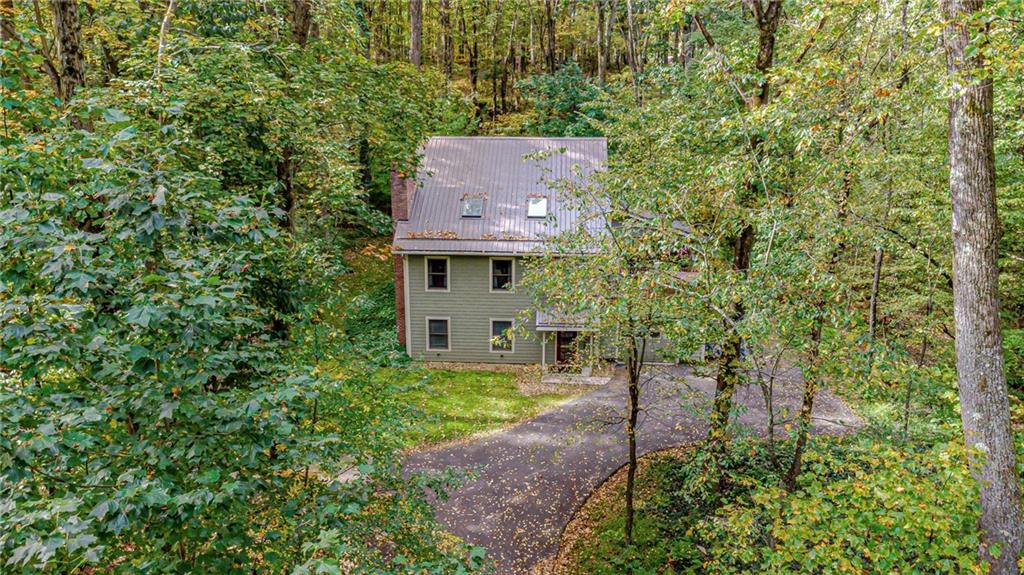 508 Forest Road Acme, PA 15610 - Photo 27 of 29 a aerial view of a house with a yard