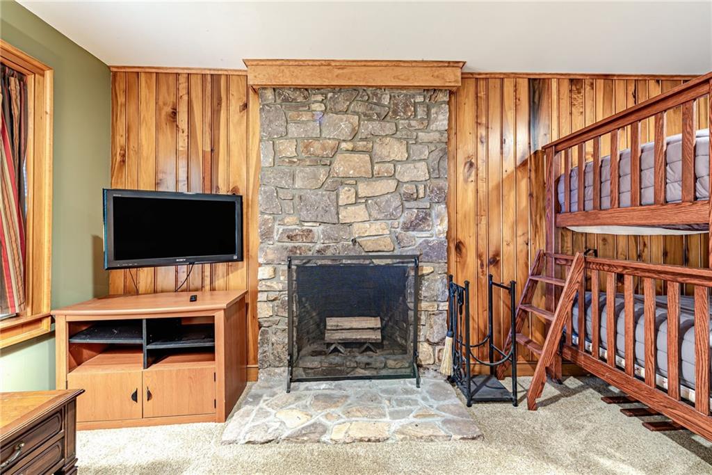 508 Forest Road Acme, PA 15610 - Photo 4 of 29 a living room with fireplace furniture and a flat screen tv