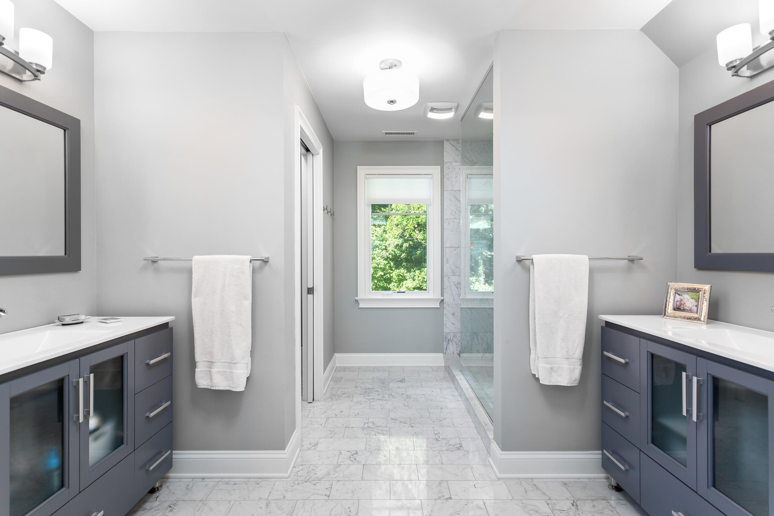 21 Ledge Road Norwalk, CT 06853 - Photo 13 of 32 a bathroom with a sink a washer and dryer