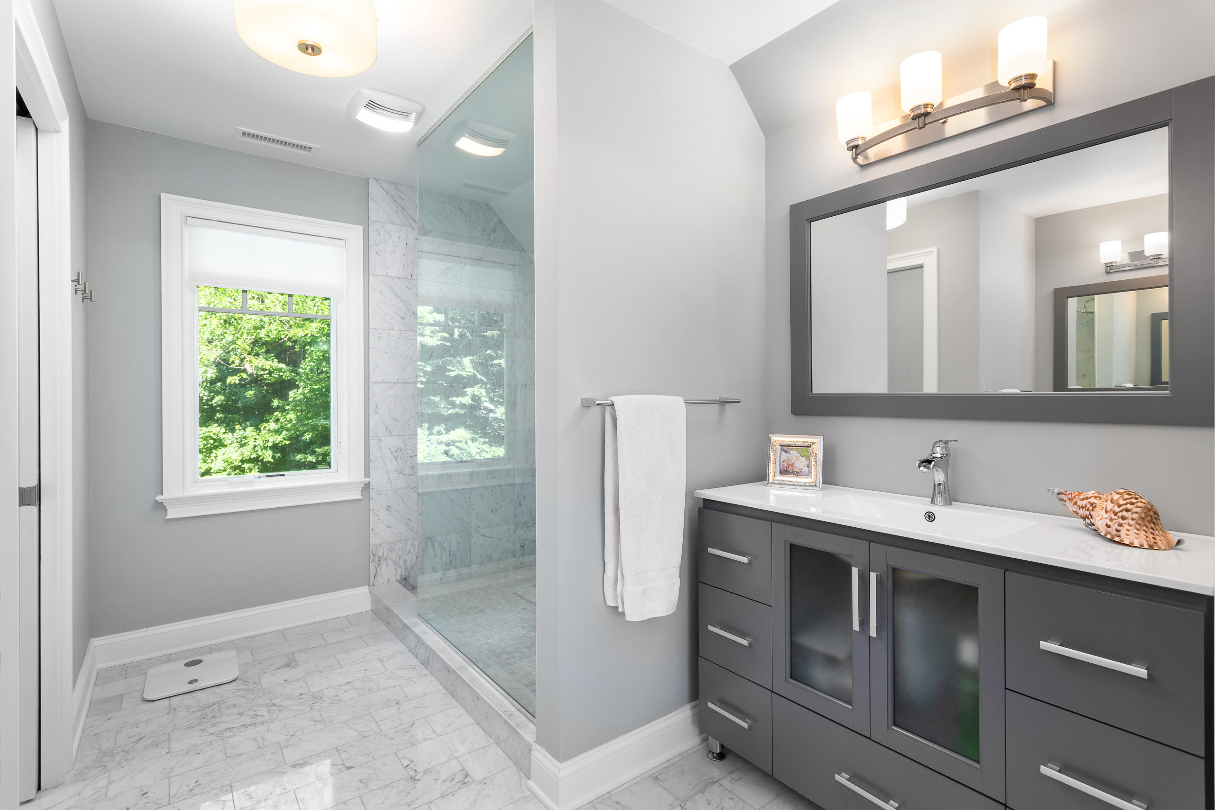 21 Ledge Road Norwalk, CT 06853 - Photo 14 of 32 a bathroom with a sink and a mirror