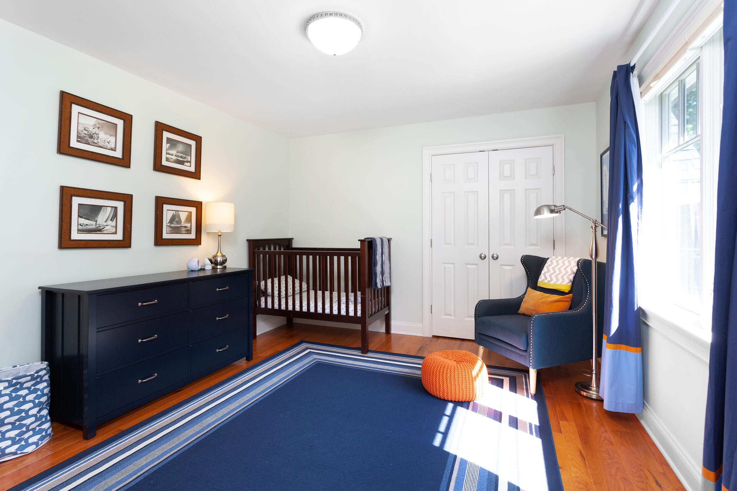 21 Ledge Road Norwalk, CT 06853 - Photo 18 of 32 a bedroom with furniture and wooden floor