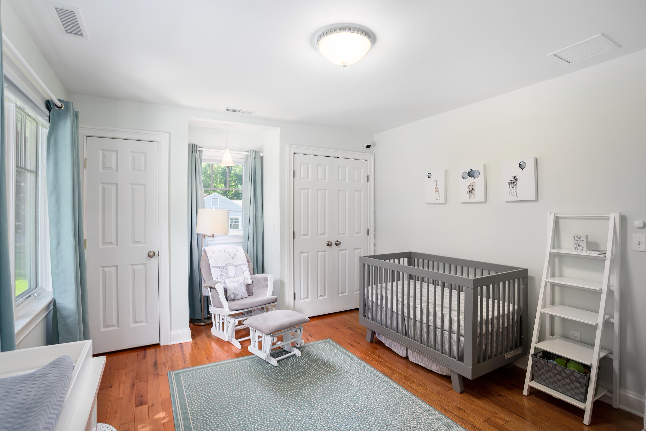 21 Ledge Road Norwalk, CT 06853 - Photo 19 of 32 a view of a bedroom with baby crib and bedroom