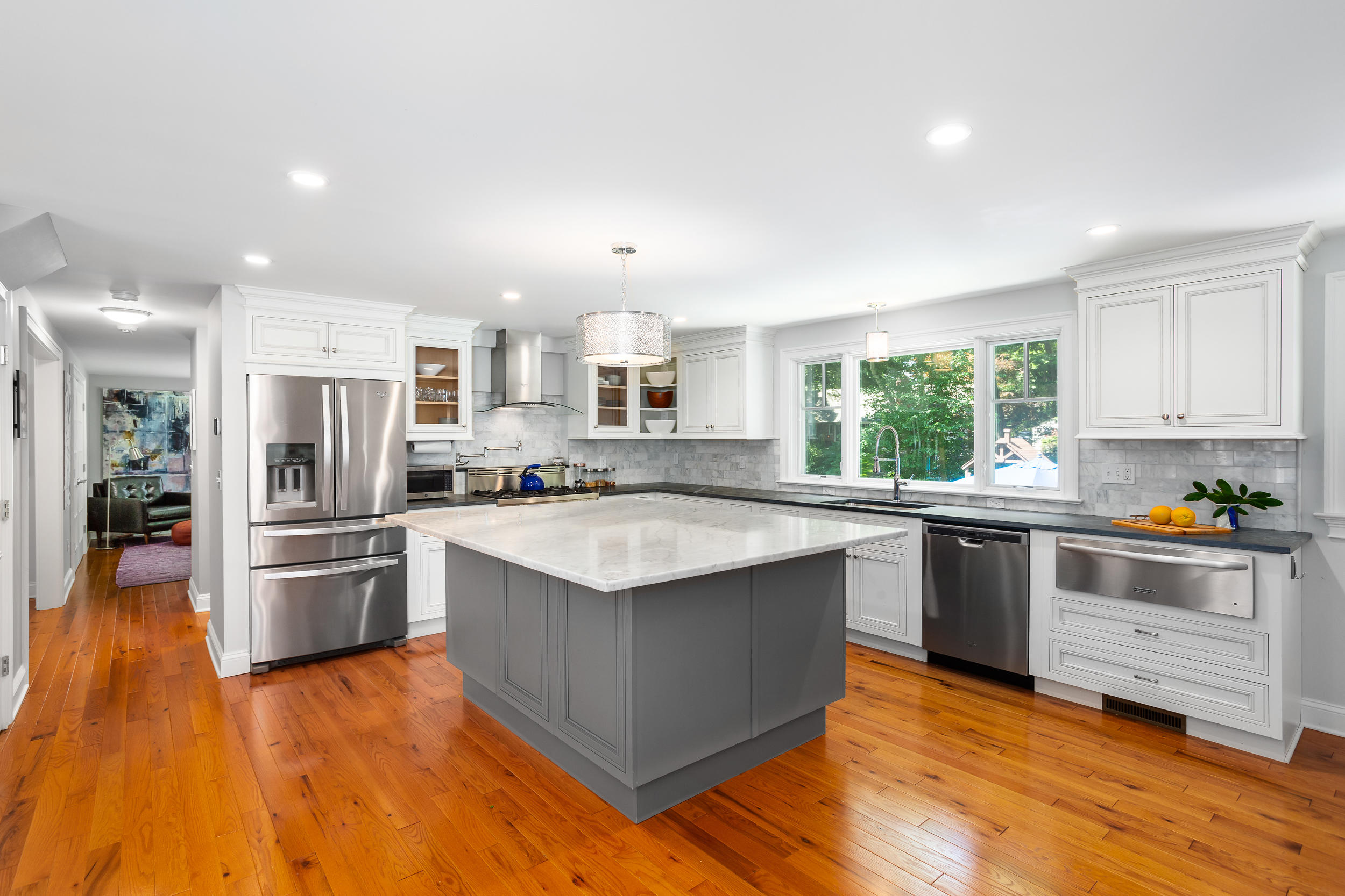 21 Ledge Road Norwalk, CT 06853 - Photo 3 of 32 a large kitchen with stainless steel appliances granite countertop a stove and a sink