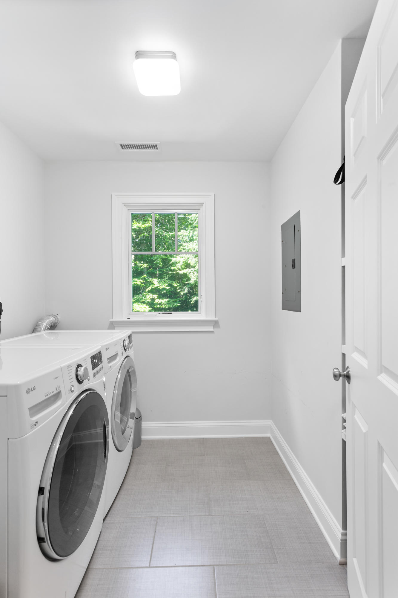 21 Ledge Road Norwalk, CT 06853 - Photo 21 of 32 a utility room with dryer and washer
