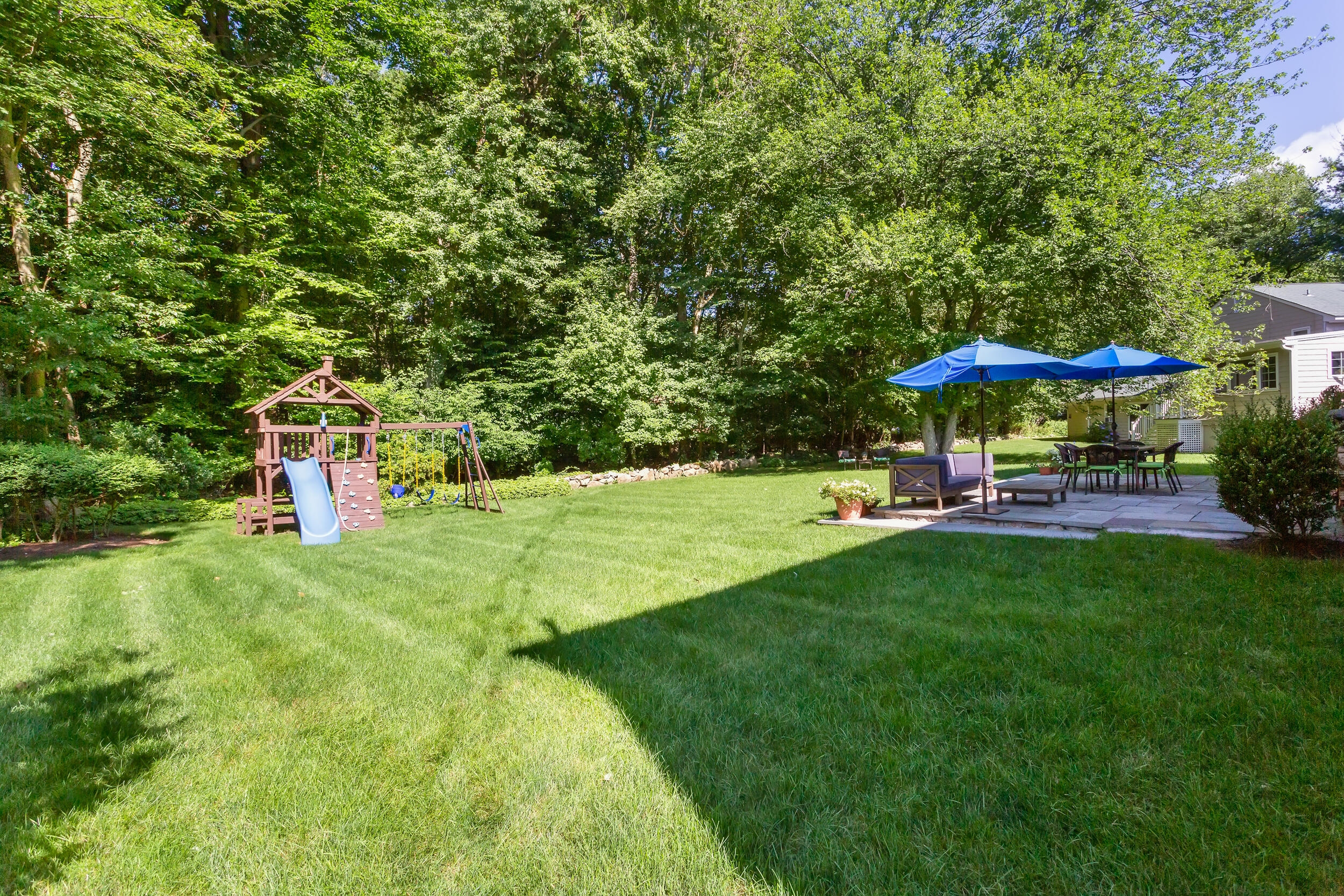 21 Ledge Road Norwalk, CT 06853 - Photo 26 of 32 a view of a garden with an outdoor space