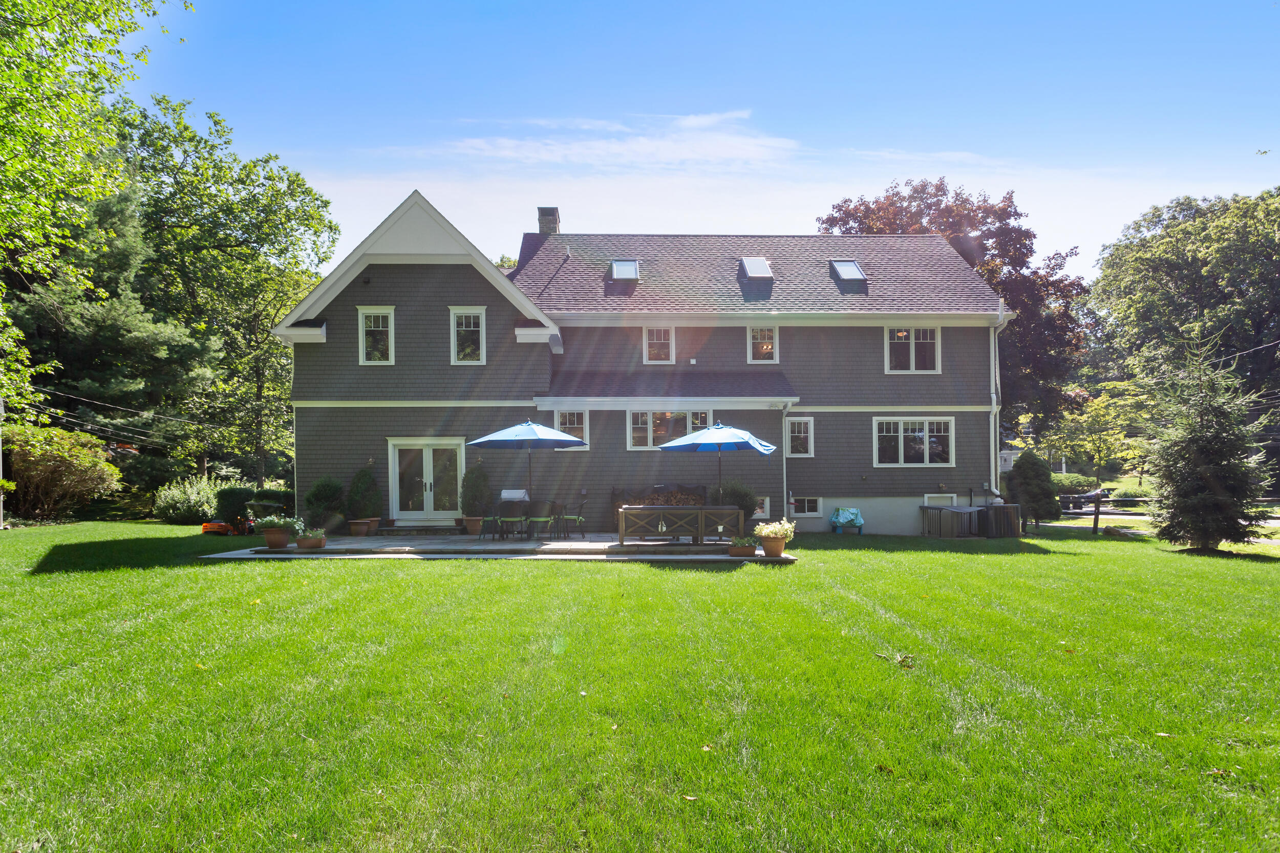 21 Ledge Road Norwalk, CT 06853 - Photo 27 of 32 a front view of house with yard and green space