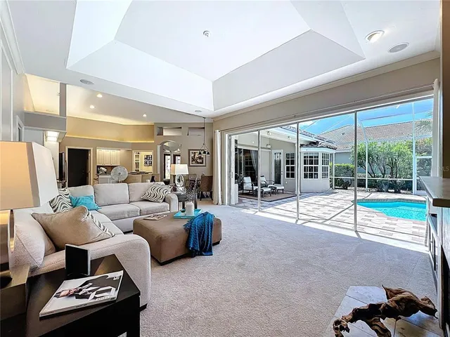 a bathroom with a tub shower and sink