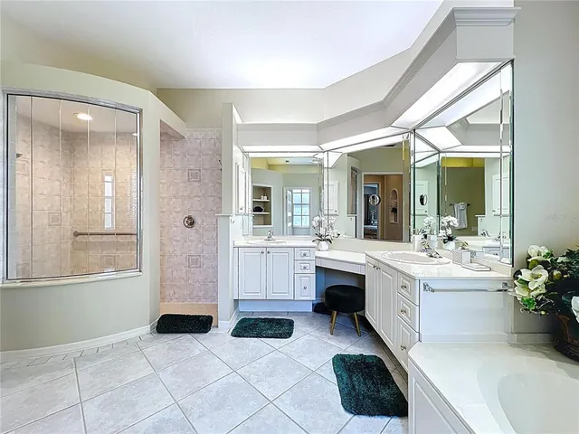 a view of a backyard with a swimming pool