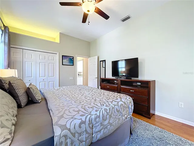 an aerial view of multiple houses with yard