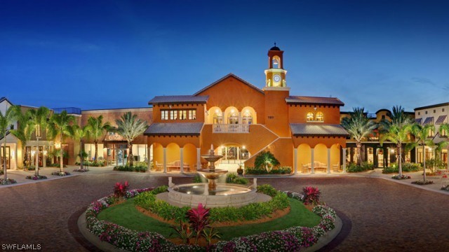 11947 Tulio Way, Unit 4002 Fort Myers, FL 33912 - Photo 18 of 26 a sign board with a big yard