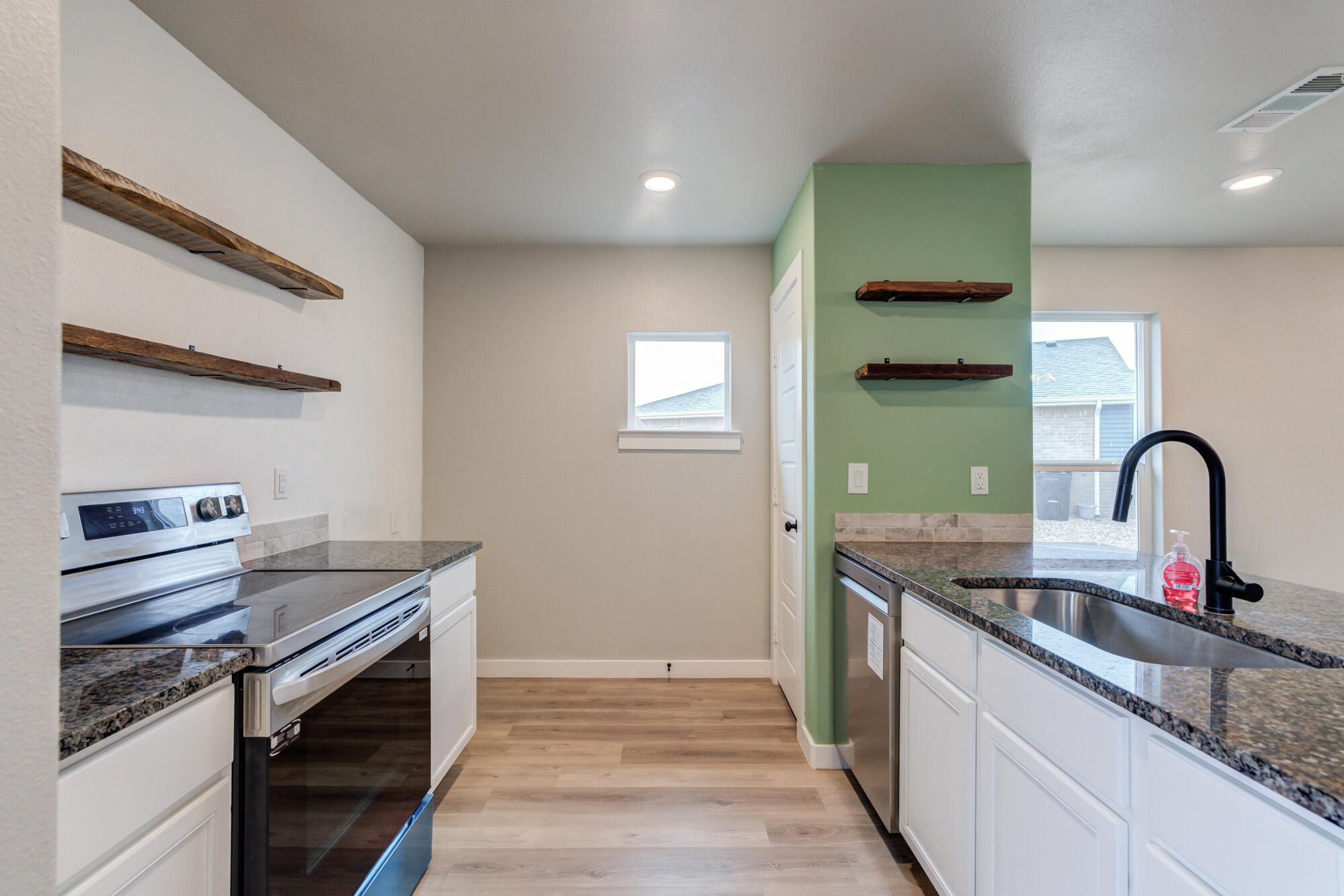 3003 Aberdeen Avenue Wolfforth, TX 79382 - Photo 7 of 12 Custom Shelves