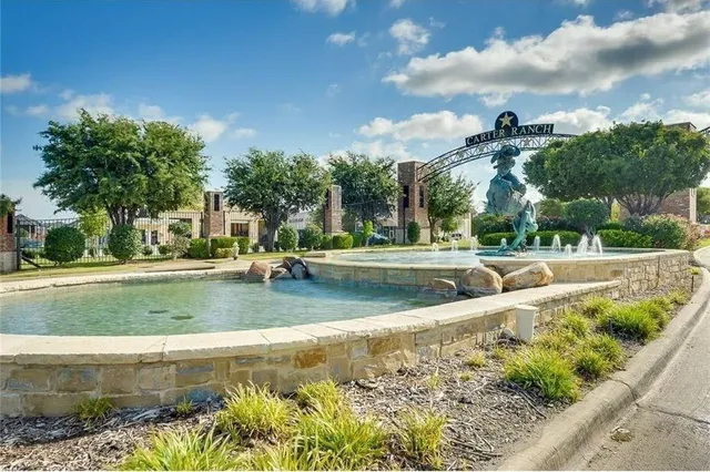 a view of a house with a big yard